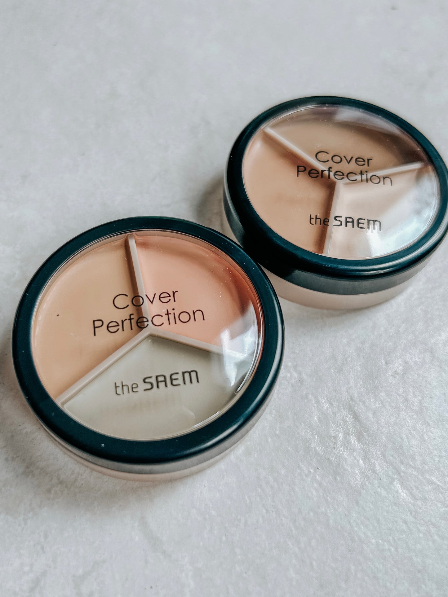 the SAEM Cover Perfection Triple Pot Concealer